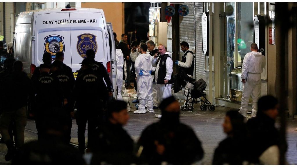 Forensic technicians work after an explosion on busy pedestrian Istiklal street in Istanbul, Turkey, 13 November, 2022 | Reuters