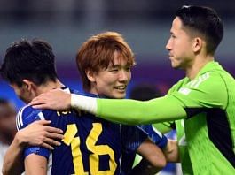 Japan's Kou Itakura celebrates with Takehiro Tomiyasu and Daniel Yabuki after the match at Khalifa International Stadium, Doha, Qatar on 23 November, 2022 | Reuters