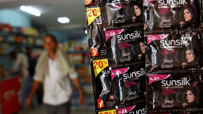 Sachets of shampoo by Sunsilk, a Hindustan Unilever Limited (HUL) brand, hang on display at a shop in the old quarters of Delhi | Reuters/Mansi Thapliyal