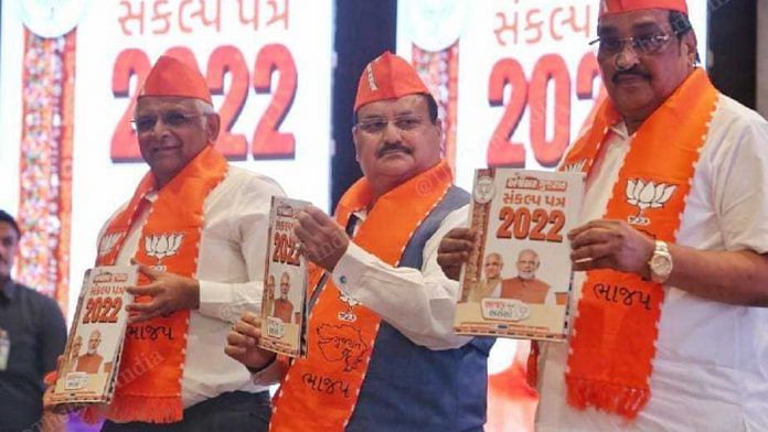 BJP President J.P. Nadda Gujarat Chief Minister and BJP state President C. R. Patil at release of Sankalp Patra for Gujarat Assembly Elections Gandhinagar. The Print Photos by Praveen Jain