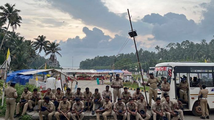File photo of police officers who are deployed as fishermen protest near the entrance of the proposed Vizhinjam Port in the southern state of Kerala, India, 9 November, 2022 | Reuters