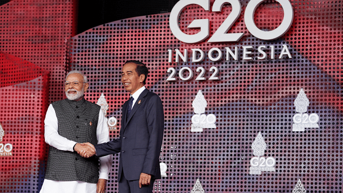 Prime Minister Narendra Modi greets Indonesia's President Joko Widodo as he arrives for the G20 leaders' summit in Nusa Dua, Bali, Indonesia,15 November, 2022. Reuters/Kevin Lamarque/Pool