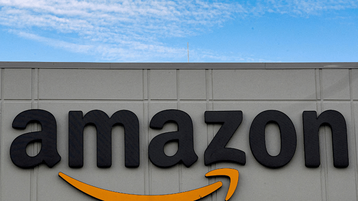 The Amazon logo is seen outside its JFK8 distribution center in Staten Island, New York, U.S. 25 November, 2020. Reuters/Brendan McDermid/File Photo