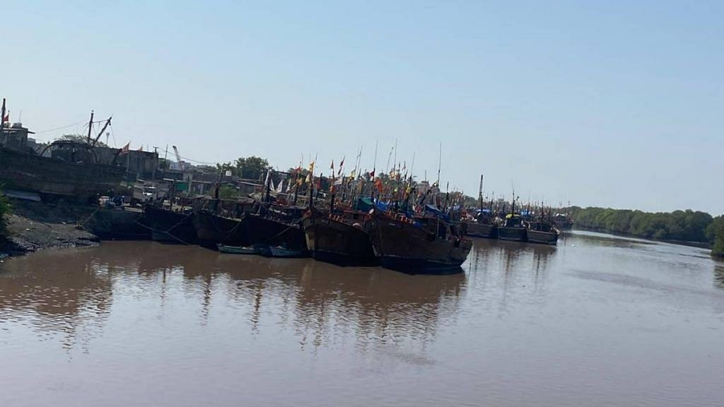 Fishing trawlers docked at the jetty near Subhash Nagar colony, Porbandar | Moushumi Das Gupta | ThePrint
