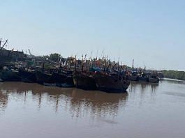 Fishing trawlers docked at the jetty near Subhash Nagar colony, Porbandar | Moushumi Das Gupta | ThePrint