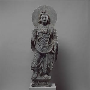 Standing Bodhisattva Maitreya (Buddha of the Future), Pakistan (ancient region of Gandhara), c. 3rd century, Gray schist. Image courtesy of The Metropolitan Museum of Art.