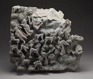 Gods and Animals in a Landscape, Fragment from a Scene of Buddha Shakyamuni's Sermon to Indra, Gandhara region, Peshawar Division (?), Pakistan, c. 2nd–early 3rd century, Gray schist with traces of paint. Image courtesy of Los Angeles County Museum of Art.