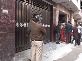 Police personnel outside the home where the crime was committed | ANI Twitter