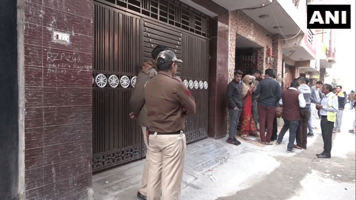 Police personnel outside the home where the crime was committed | ANI Twitter