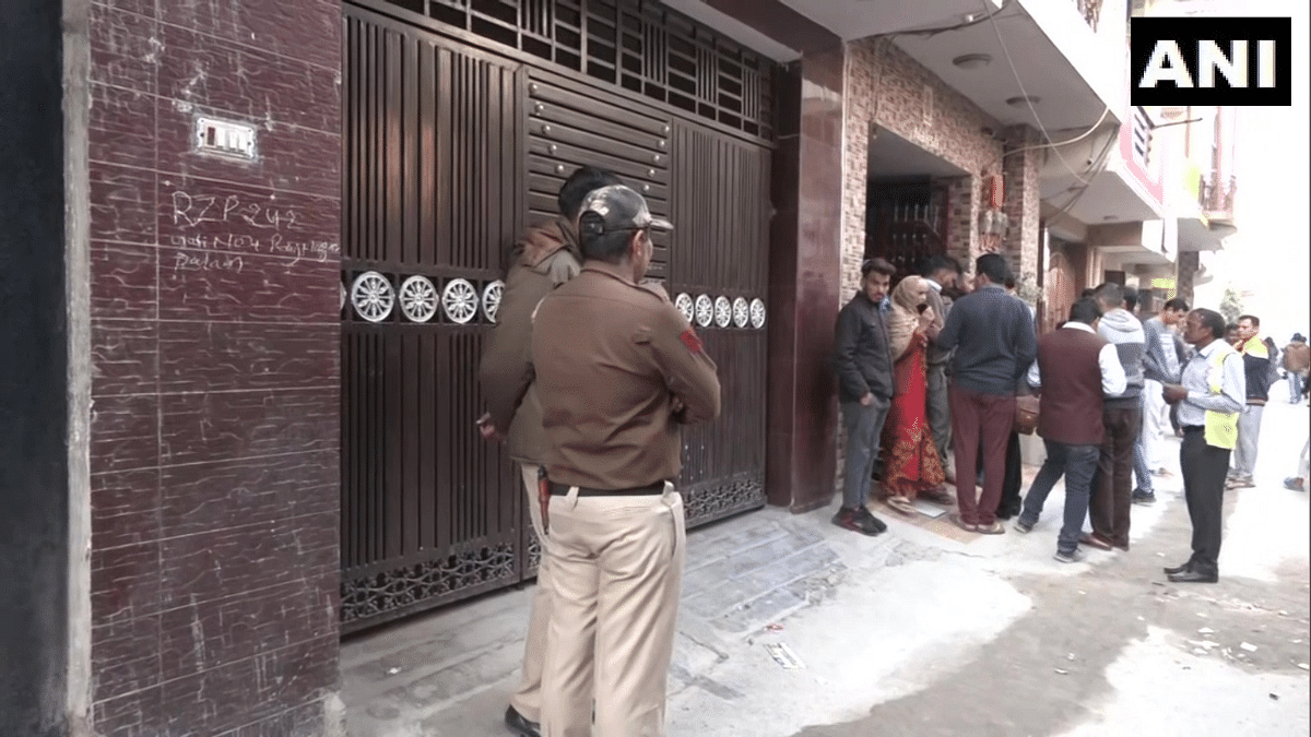 palam murder Police personnel outside the home where the crime was committed | ANI Twitter