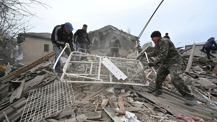 Rescuers work at the site of a maternity ward of a hospital destroyed by a Russian missile attack, as their attack on Ukraine continues, in Vilniansk, Zaporizhzhia region, Ukraine 23 November 2022 | Reuters/Stringer