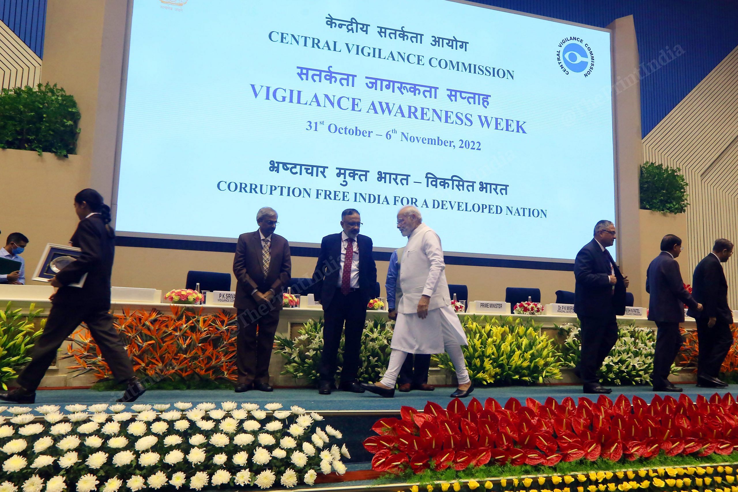 PM Modi after presenting a prize to a student for winning an essay writing competition at the launch of the Complaint Management System portal of Central Vigilance Commission amid Vigilance Awareness Week 2022 in New Delhi | Photo: Praveen Jain | ThePrint