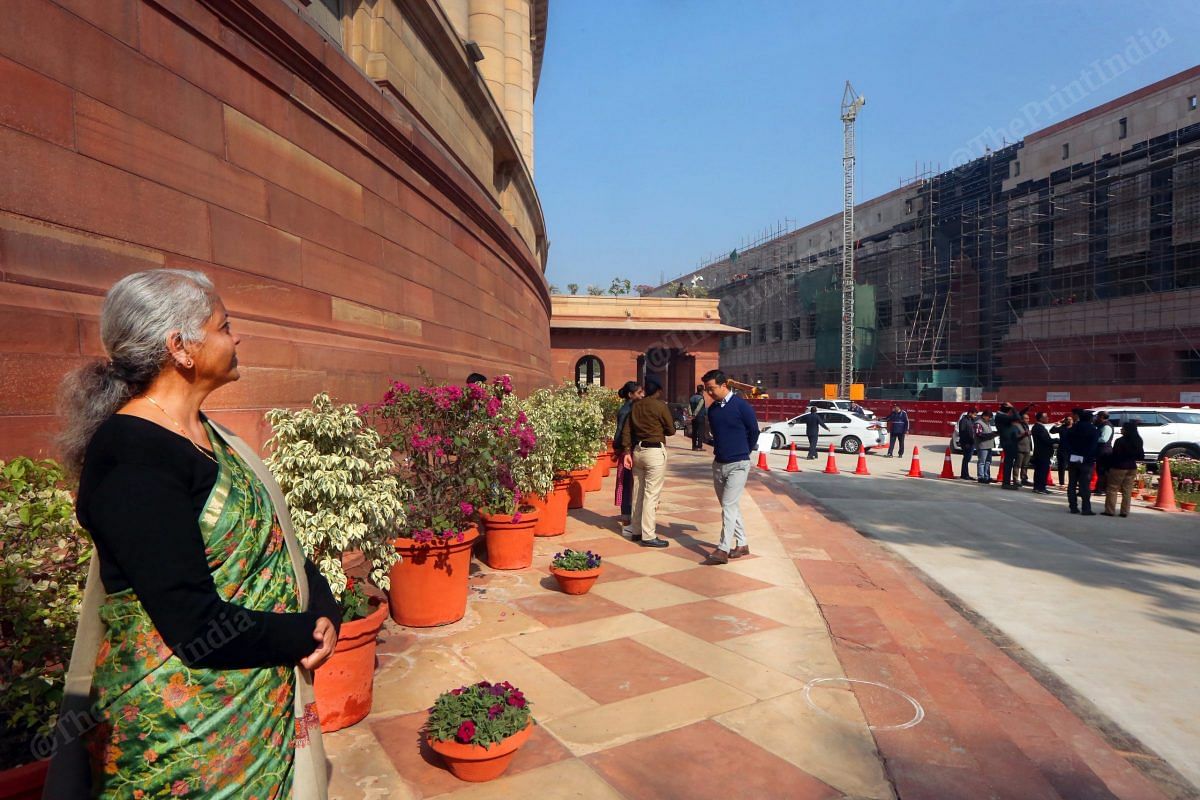 Finance minister Nirmala Sitharaman looks at the construction of the new Parliament building | Photo: Praveen Jain | ThePrint