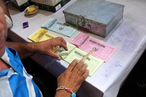 Tickets being stamped before a show in Guwahati | Suraj Singh Bisht, ThePrint