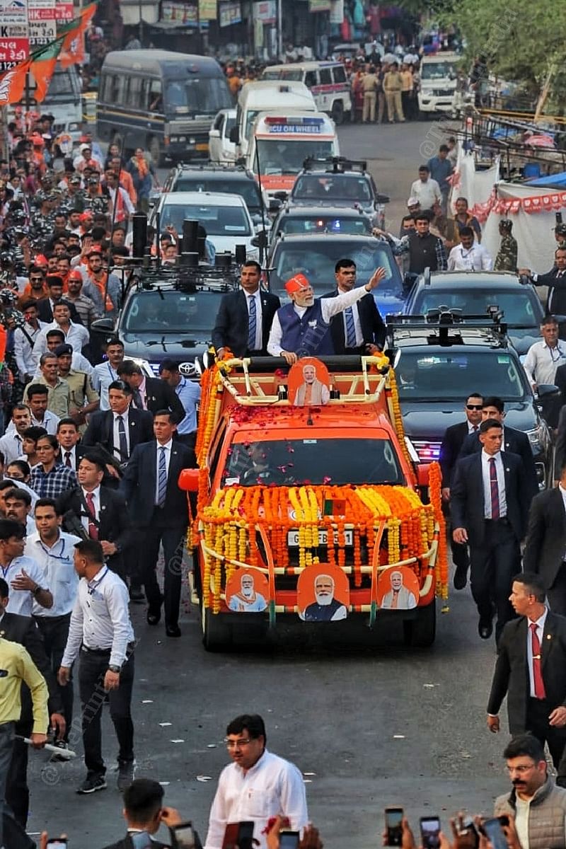 Security personnel accompanying Modi during roadshow | Photo: Praveen Jain | ThePrint