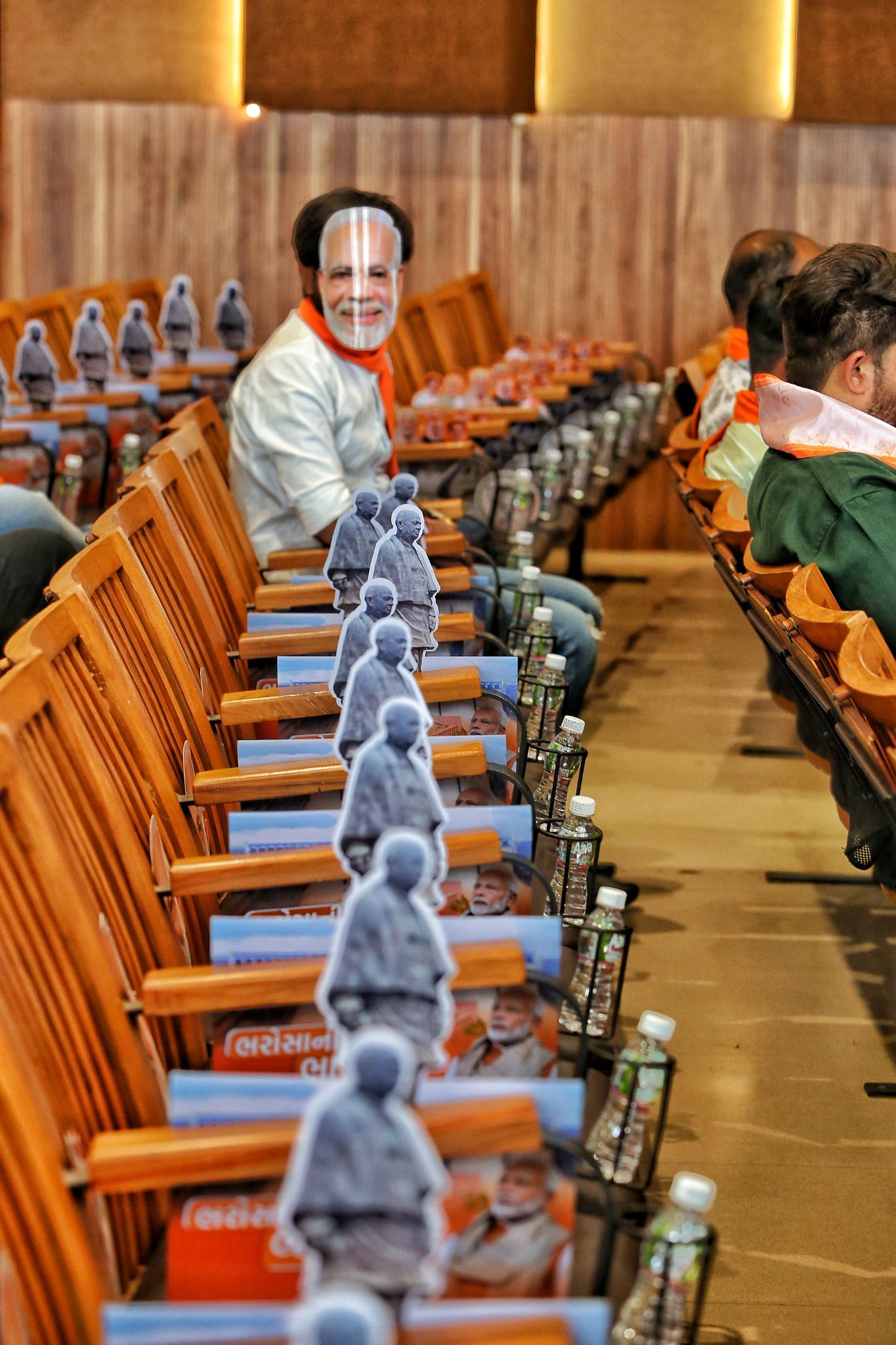 November 2022: BJP’s campaign in Gujarat was in full swing. PM Modi, and ministers Amit Shah, Rajnath Singh, Smriti Irani and party president J.P. Nadda all reached Gujarat for campaigning. This photo was taken at BJP’s manifesto launch, where Bhupendra Patel was also present. The BJP office in Ahmedabad had chairs decorated with Modi’s posters and Vallabhbhai Patel stickers | Praveen Jain, ThePrint