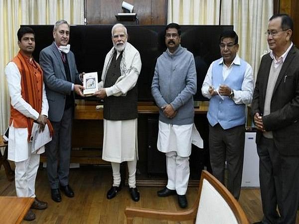 Dharmendra Pradhan presents book titled 'India: The Mother of Democracy' to PM Modi 