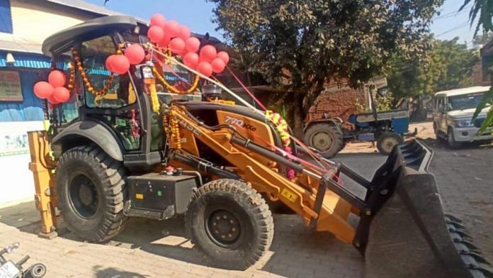 The bulldozer gifted by Parsram Prajapati to his daughter at her wedding | Credit: Special arrangement