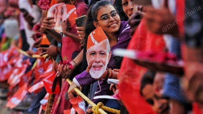 Women supporters wearing Modi masks | Photo: Praveen Jain | ThePrint
