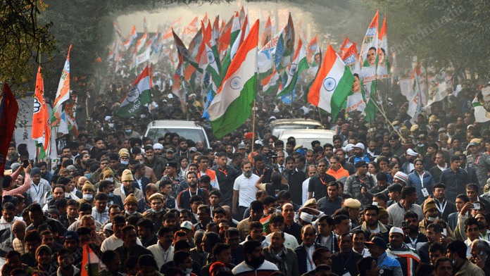 Congress supporters take part in Rahul Gandhi-led Bharat Jodo Yatra | Photo: Suraj Singh Bisht | ThePrint