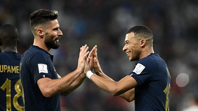 France's Kylian Mbappe celebrates scoring his second goal with Olivier Giroud against Poland at Al Thumama Stadium, Doha on 4 December 2022 | Reuters/Dylan Martinez