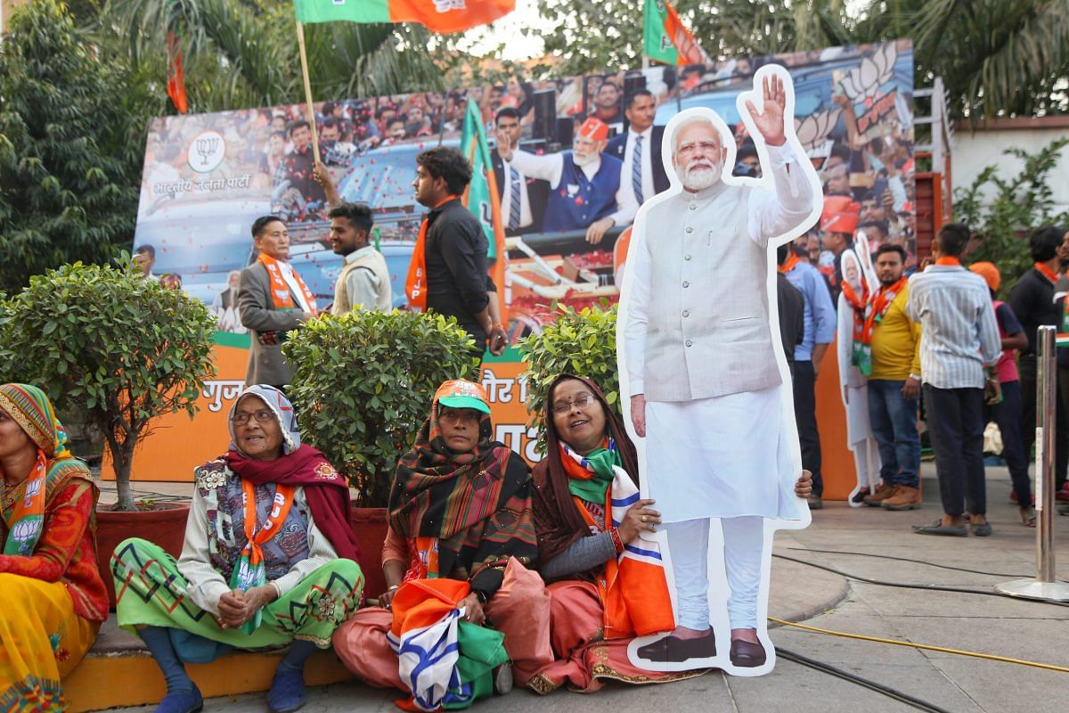 Women supporters with a cutout of PM Modi | Photo: Manisha Mondal | ThePrint