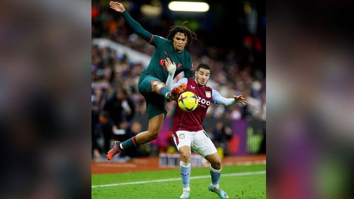 Liverpool's Trent Alexander-Arnold in action with Aston Villa's Emiliano Buendia Action Images via Reuters/Paul Childs