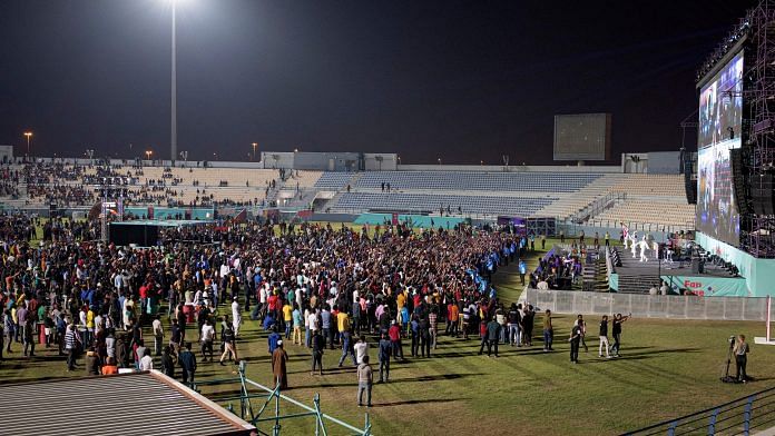 Migrant workers during the opening match of the 2022 World Cup between Qatar and Ecuador in Doha on 20 November 2022 | Photo: Reuters/Marko Djurica