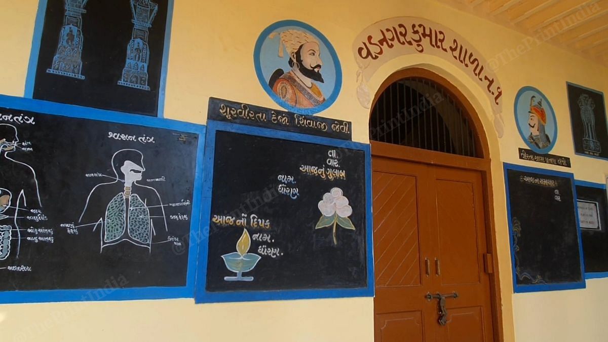 Paintings on the school’s walls to recreate how the school looked in the 1950s | Credit: Manisha Mondal, ThePrint