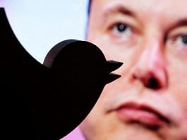 A 3D printed Twitter logo is seen in front of a displayed photo of Elon Musk in this illustration taken 27 October, 2022 | Reuters/Dado Ruvic/Illustration