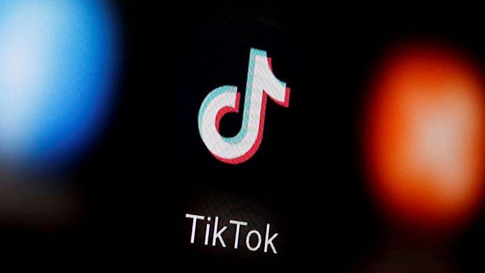 A TikTok logo is displayed on a smartphone in this illustration | Reuters/Dado Ruvic