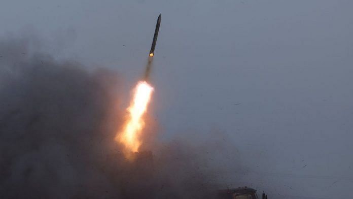 A Ukrainian BM-21 Grad multiple rocket launcher fires a rocket, as Russia's attack on Ukraine continues at the frontline in Bakhmut, Ukraine, 25 December, 2022 | Reuters