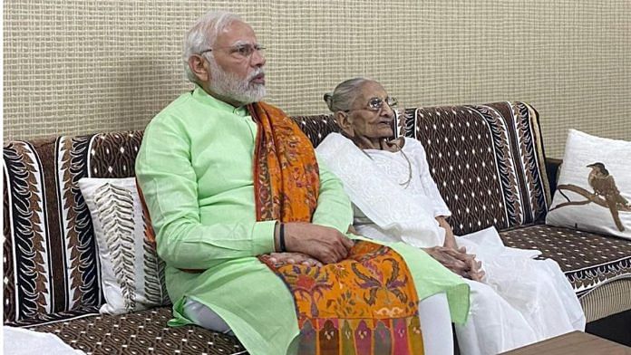 Prime Minister Narendra Modi meets his mother Hiraben Modi, at her residence, in Gandhinagar on 4 December, 2022 | ANI