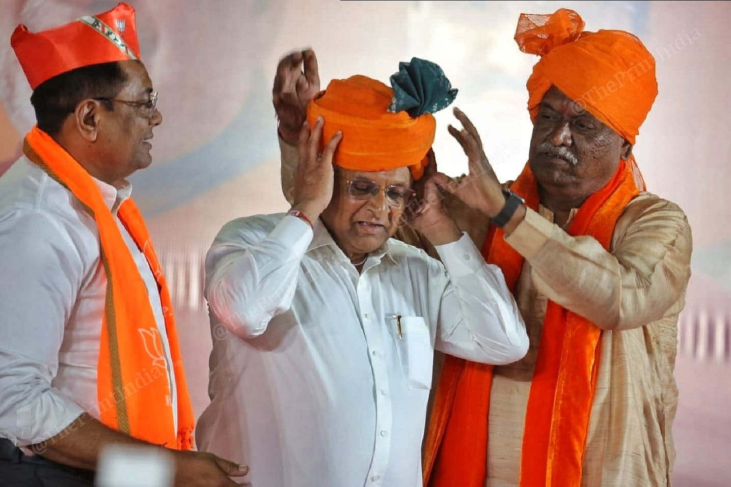 BJP leaders pays tribute to CM Bhupendra Patel with the turban during the rally | Photo: Praveen Jain | ThePrint