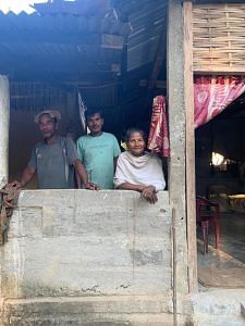 Putoli Gogoi with her two sons at their house in Dirak-II village, Kakopathar. The family awaits the return of Budheswar Gohain alias Mriganka Asom | Karishma Hasnat