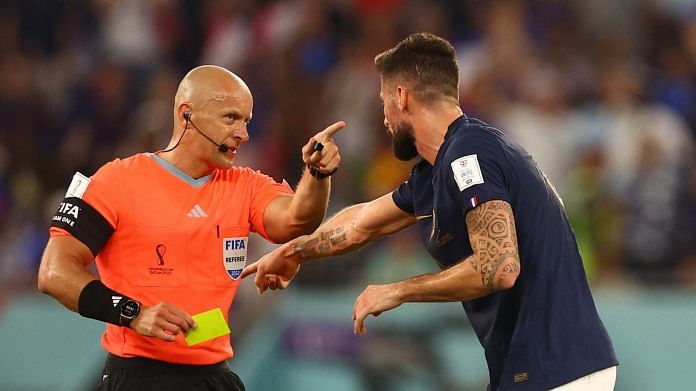 France's Olivier Giroud reacts towards referee Szymon Marciniak during a match at Stadium 974 in Doha, Qatar on 26 November 2022 | Photo: Reuters /Hannah Mckay