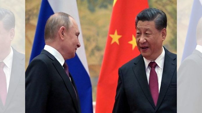 Russian President Vladimir Putin with Chinese President Xi Jinping. (Photo Credit - Reuters)