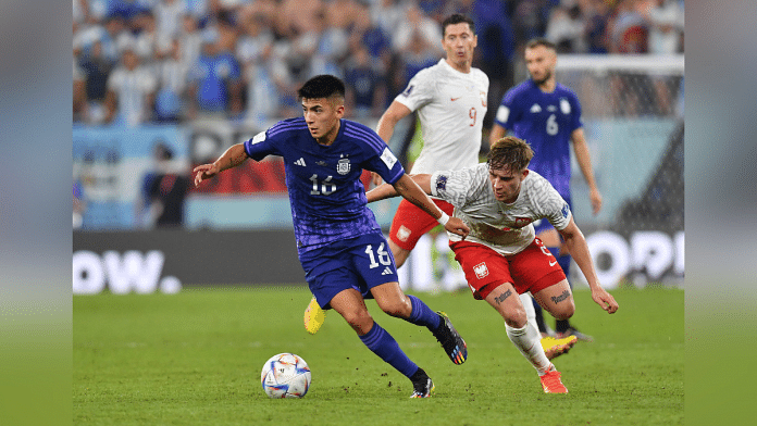 Argentina's Thiago Almada in action with Poland's Michal Skoras | Reuters Photo/Jennifer Lorenzini