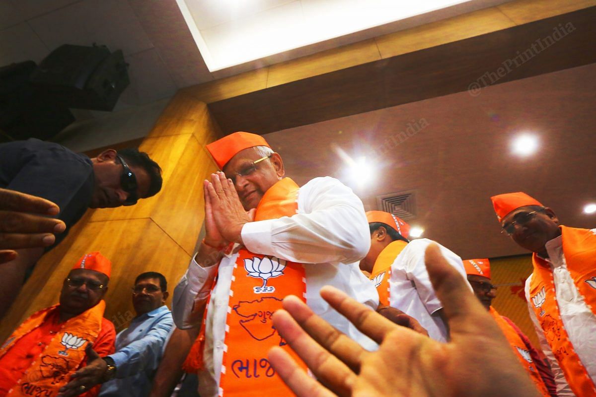 The Gujarat CM greets BJP members at the BJP headquarters in Gandhinagar | Photo: Praveen Jain | ThePrint