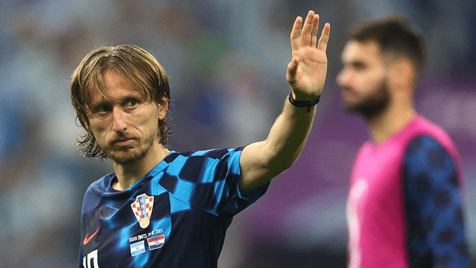 Croatia's Luka Modric waves to the fans after the match as Croatia are eliminated from the World Cup | Reuters Photo/Carl Recine