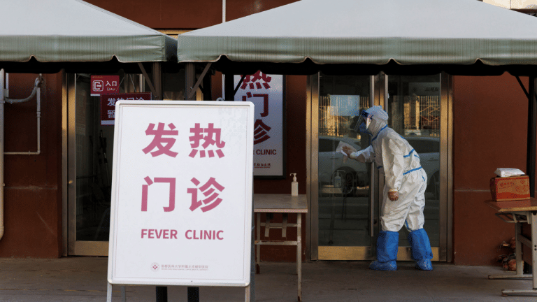 Two Chinese cities ease Covid curbs, day after protesters clash with police