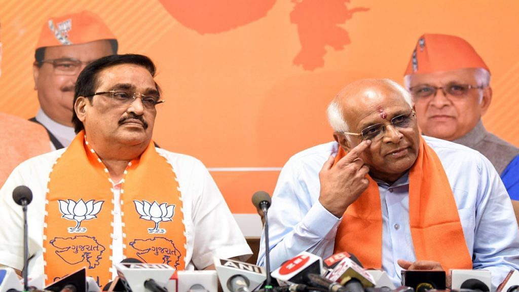 Gujarat caretaker chief minister Bhupendra Patel addresses a press conference with BJP state chief C R Patil after attending the newly-elected BJP MLAs' meeting, at the party office, in Gandhinagar on Saturday | ANI