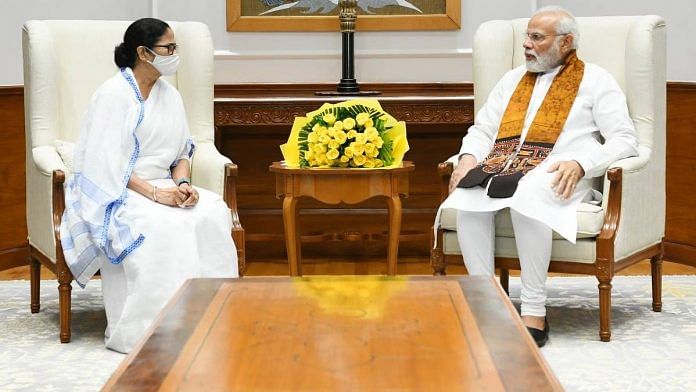 File photo of West Bengal CM Mamata Banerjee with PM Narendra Modi at a meeting in New Delhi in August | Twitter | @PMOIndia