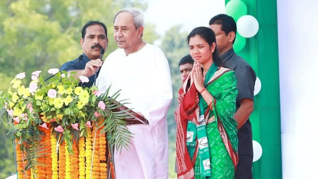 Odisha Chief Minister Naveen Patnaik at a rally in Padampur on 2 December. Seen with him is BJD candidate Barsha Singh Bariha, the daughter of the incumbent MLA whose death made the bypoll necessary | Credit: Twitter/@bjd_odisha