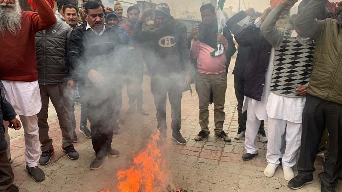 Demonstrators burn effigies, demanding hike in support prices of sugarcane, in Karnal, Haryana on Thursday | By special arrangement