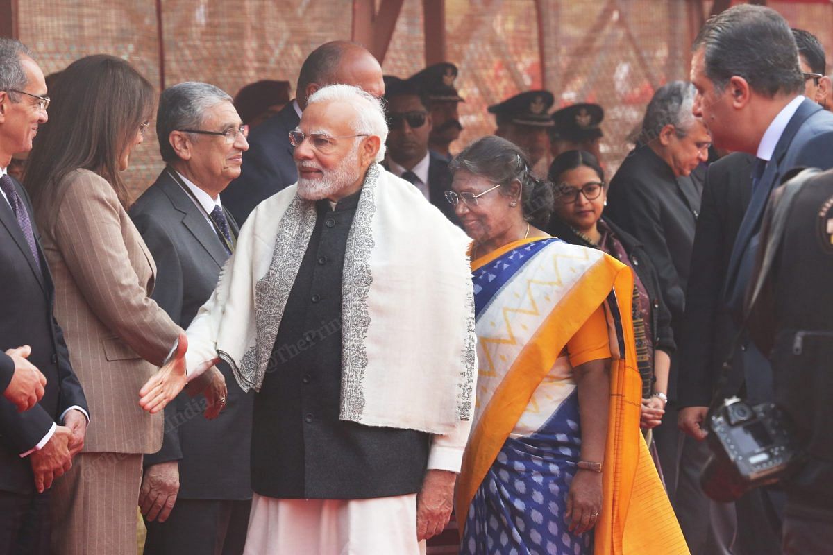 PM Modi meets the delegation and is being followed by President Mumroo.  Photo: Praveen Jain |  impression