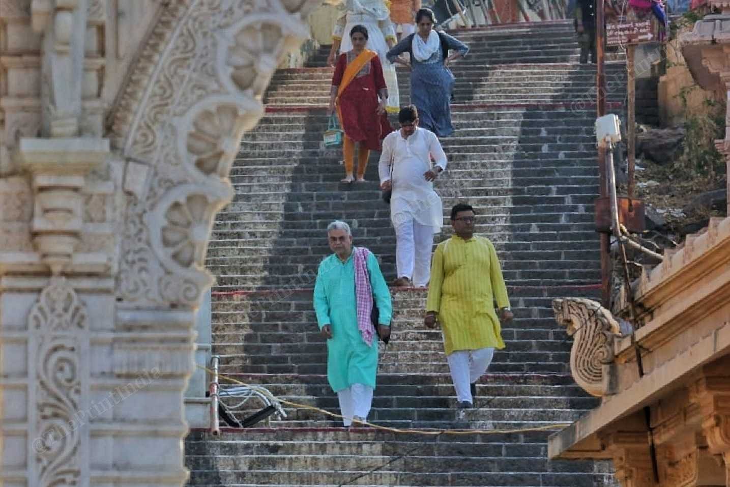 Pilgrims return after paying obeisance at a temple | Praveen Jain | ThePrint