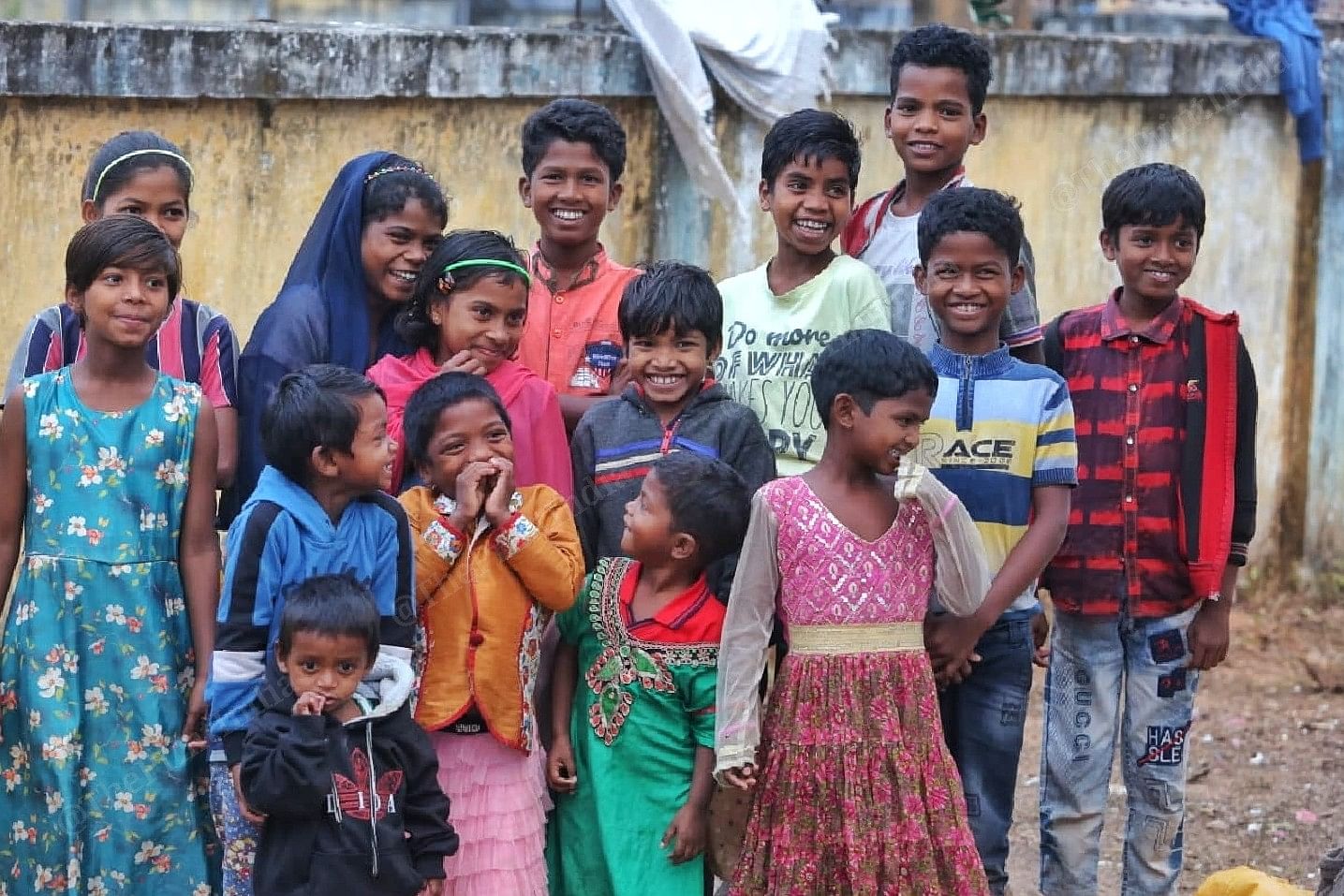 The children are all smiles as they pose for the camera | Photo: Praveen Jain | ThePrint