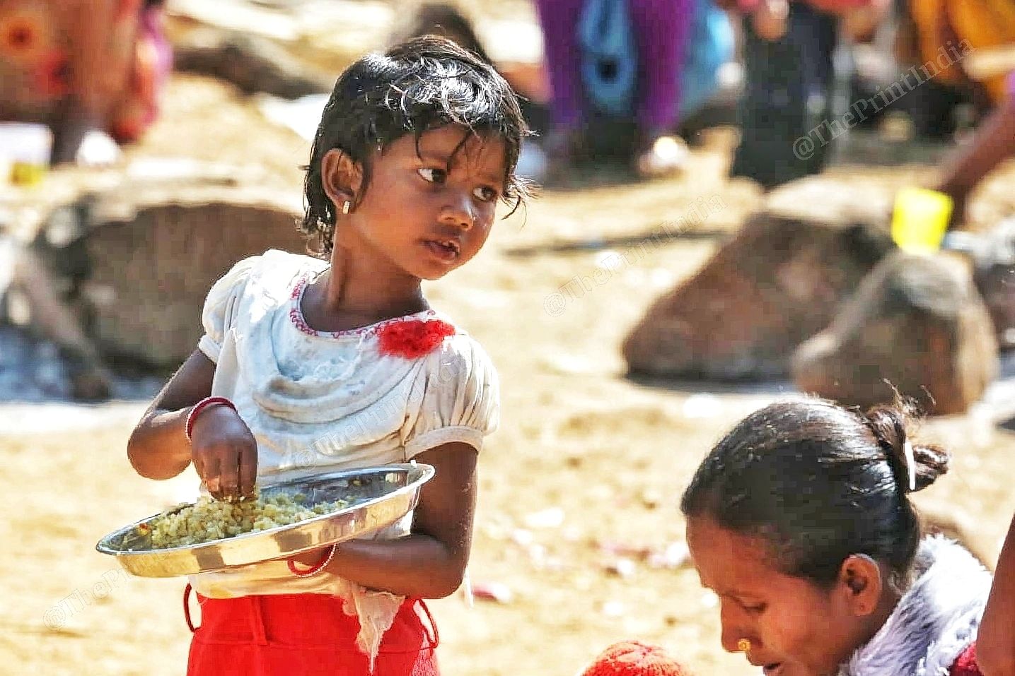 Meal-time at the camp | Photo: Praveen Jain | ThePrint