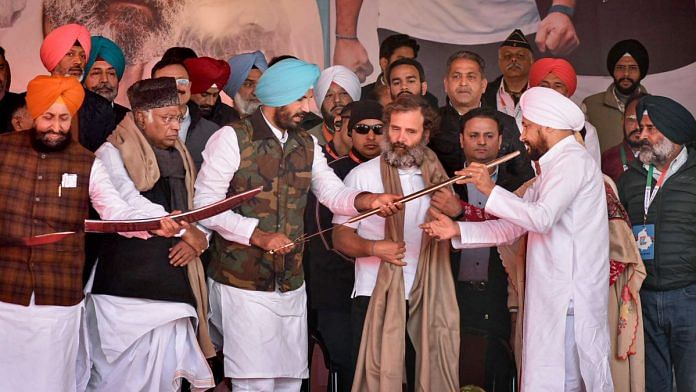 Congress President Mallikarjun Kharge with party leader Rahul Gandhi and others during a public meeting amid the party's Bharat Jodo Yatra, in Pathankot, on 19 January 2023 | PTI